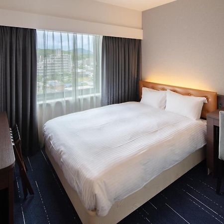 Shin Iizuka Station Hotel Bagian luar foto