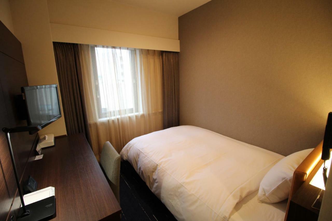 Shin Iizuka Station Hotel Bagian luar foto