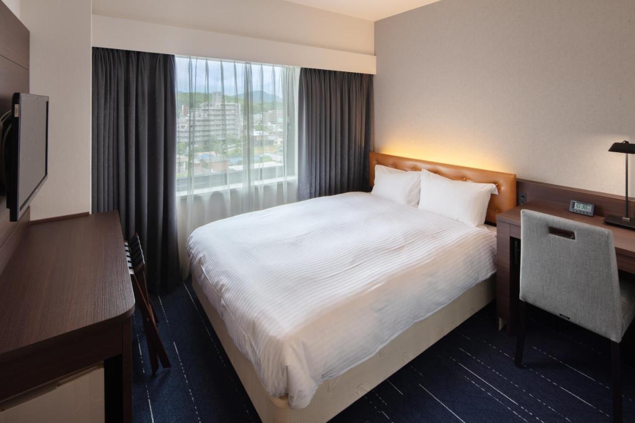 Shin Iizuka Station Hotel Bagian luar foto