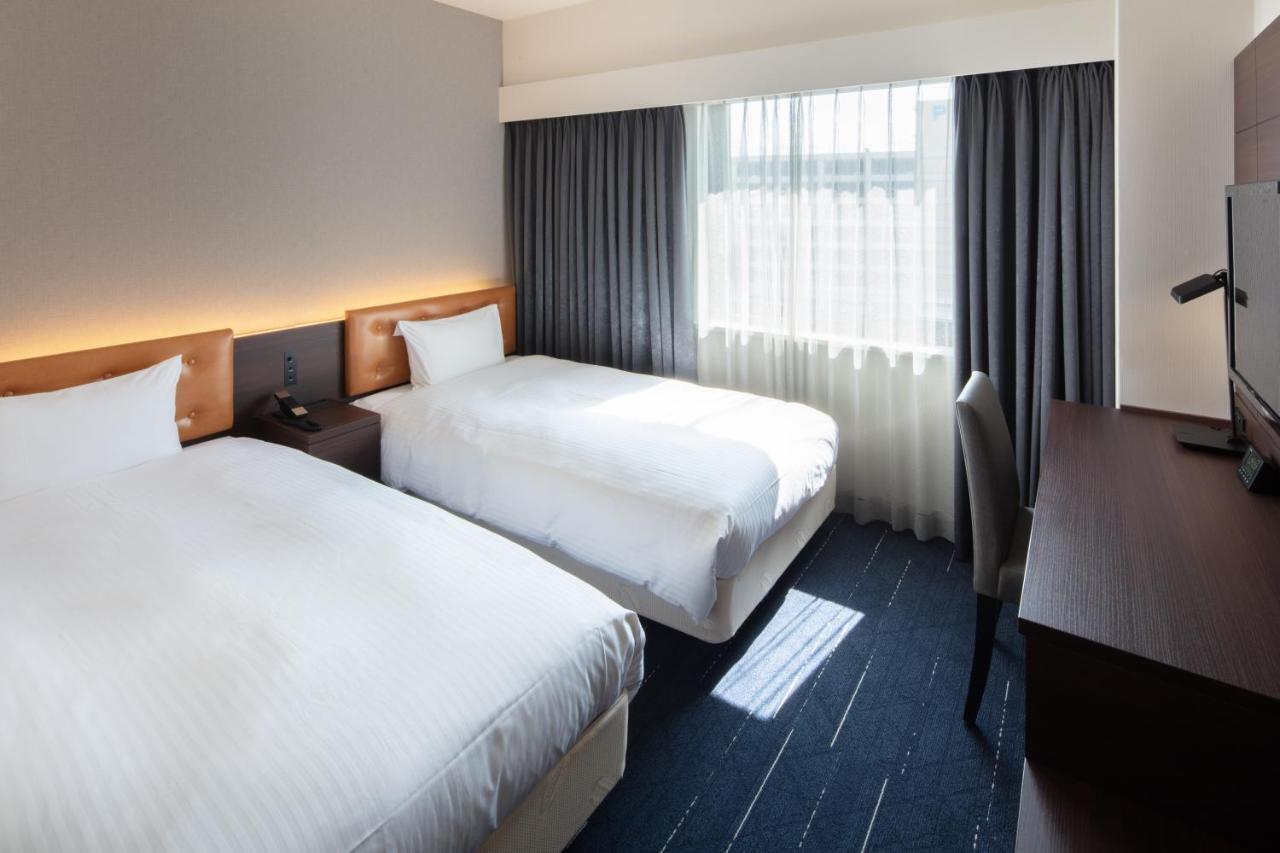 Shin Iizuka Station Hotel Bagian luar foto